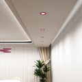 pink CCT fire-rated LED downlights in a dining room
