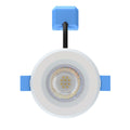 front of a white fixed CCT LED downlight