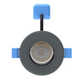 front of a charcoal grey tilt CCT downlight