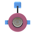 front of a pink CCT tilt LED downlight
