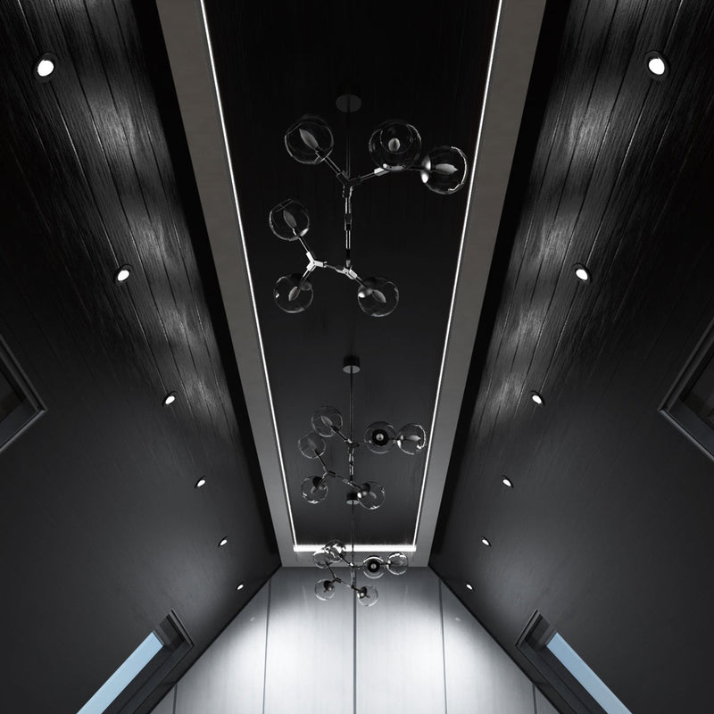 ceiling with mounted black CCT tilt LED downlights