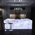 full shot of a kitchen with an illuminated island in cool white light