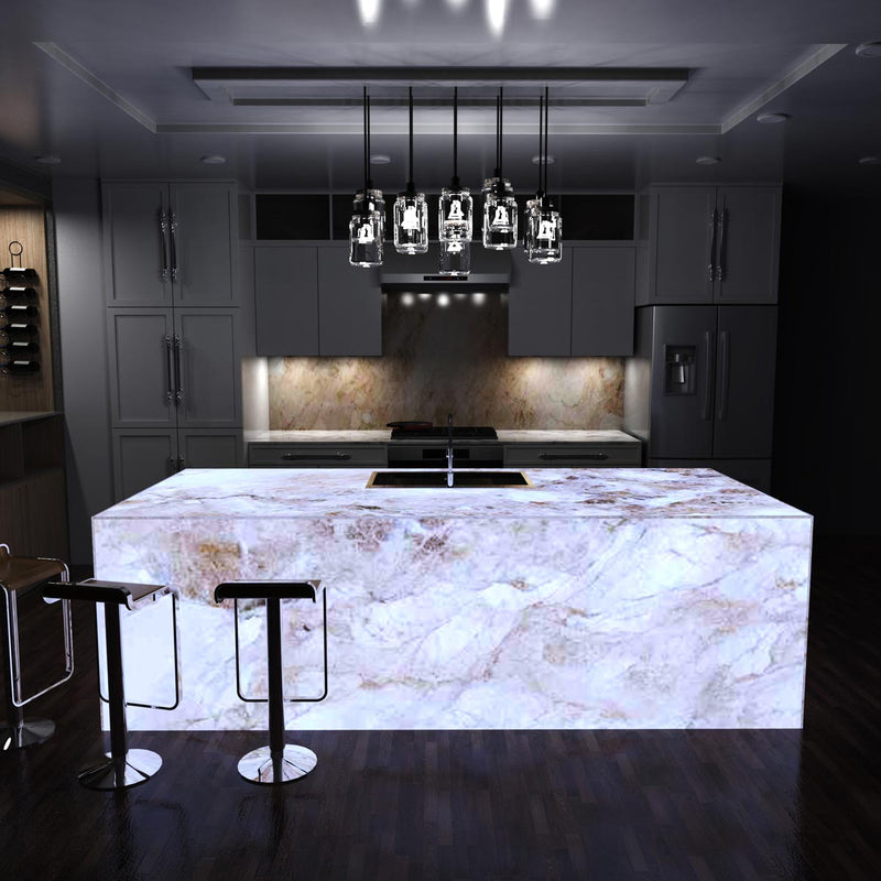 full shot of a kitchen with an illuminated island in cool white light