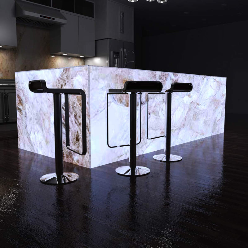 side shot of a kitchen with an illuminated island in cool white light