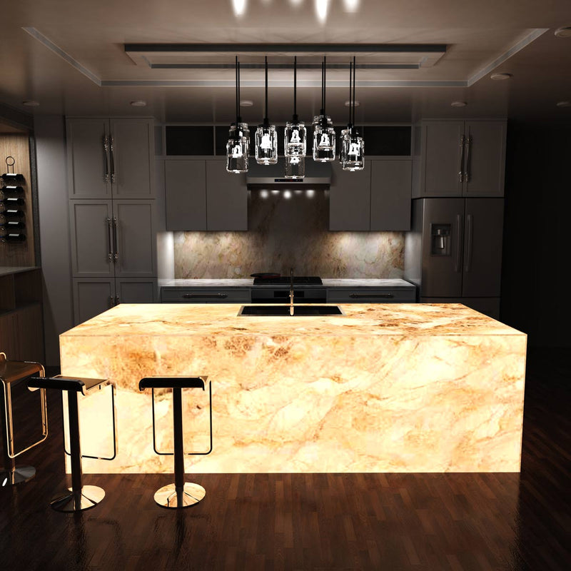 full shot of a kitchen with an illuminated island in warm white light