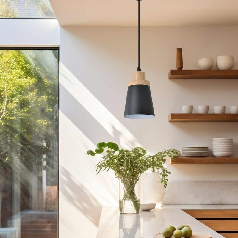 Mounted Black Cylindrical LED Pendant Light with Wooden Crown over a kitchen counter