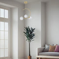 Installed Crescent Shaped Pendant Light with Three Glass Spheres 