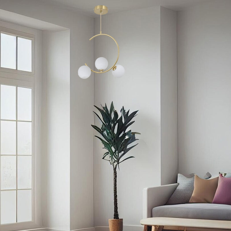 Installed Crescent Shaped Pendant Light with Three Glass Spheres 