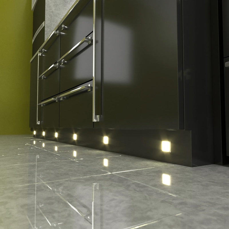 Side shot of a mounted square LED plinth light with warm white light