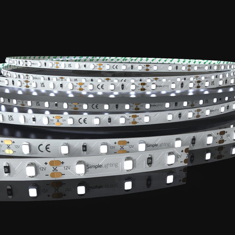 Cool white led tape on a black background, zoomed into the pcb