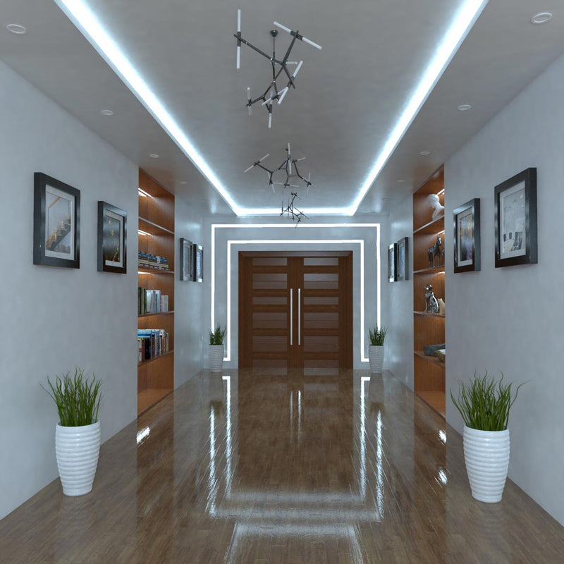 Hall way with cool white led tape in the ceiling and book case