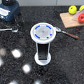 Close up to the QI charger of a popup plug socket
