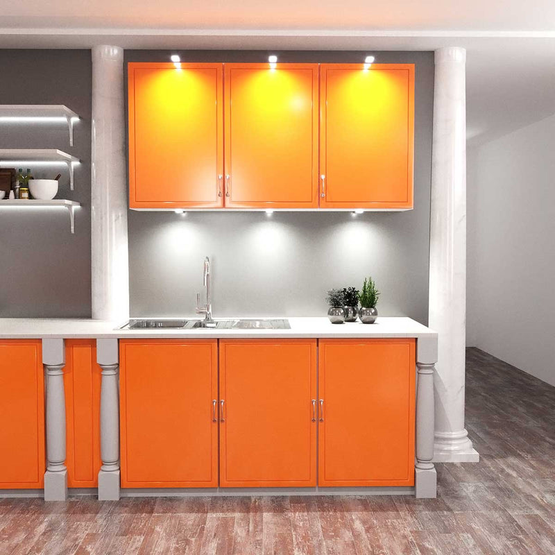 Mid shot of a kitchen with an over and under cabinet light 