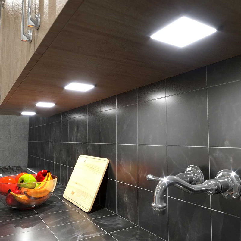 Side view of a flat panel LED under cabinet light on a kitchen cabient