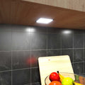 Close-up of a flat panel LED under cabinet light on a cabinet
