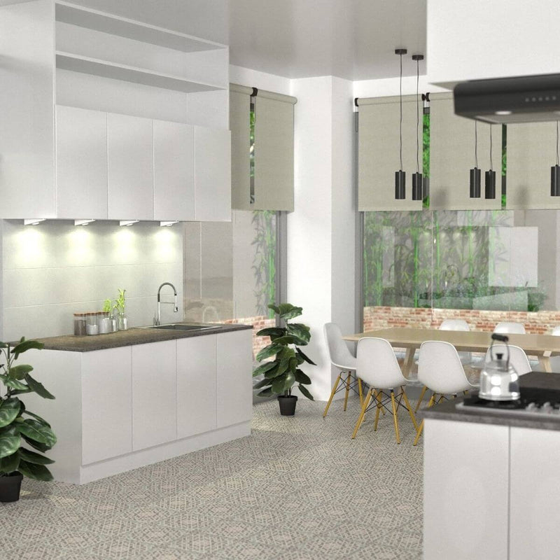 Full shot of a kitchen with four triangle under cabinet lights with a warm white light