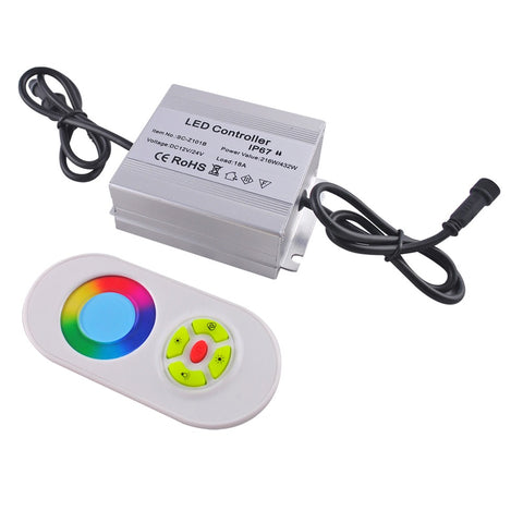 white background with product close up on a silver LED controller and remote control